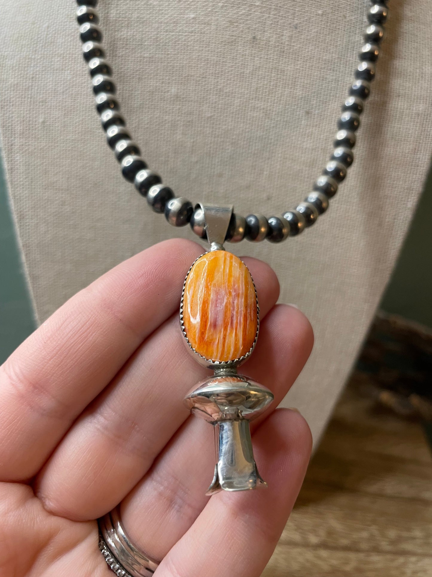 Navajo Handmade Sterling Silver Orange Spiny Blossom Pendant